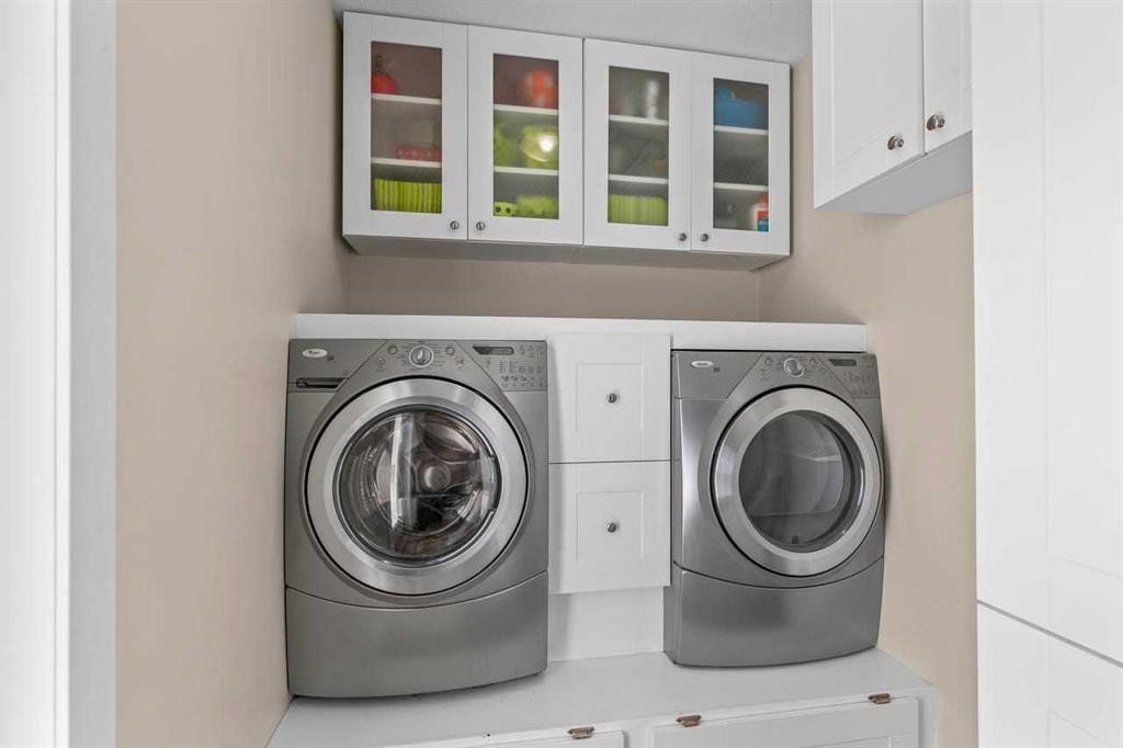 317 Mcleod Crescent, Diamond Valley, AB - Indoor Photo Showing Laundry Room