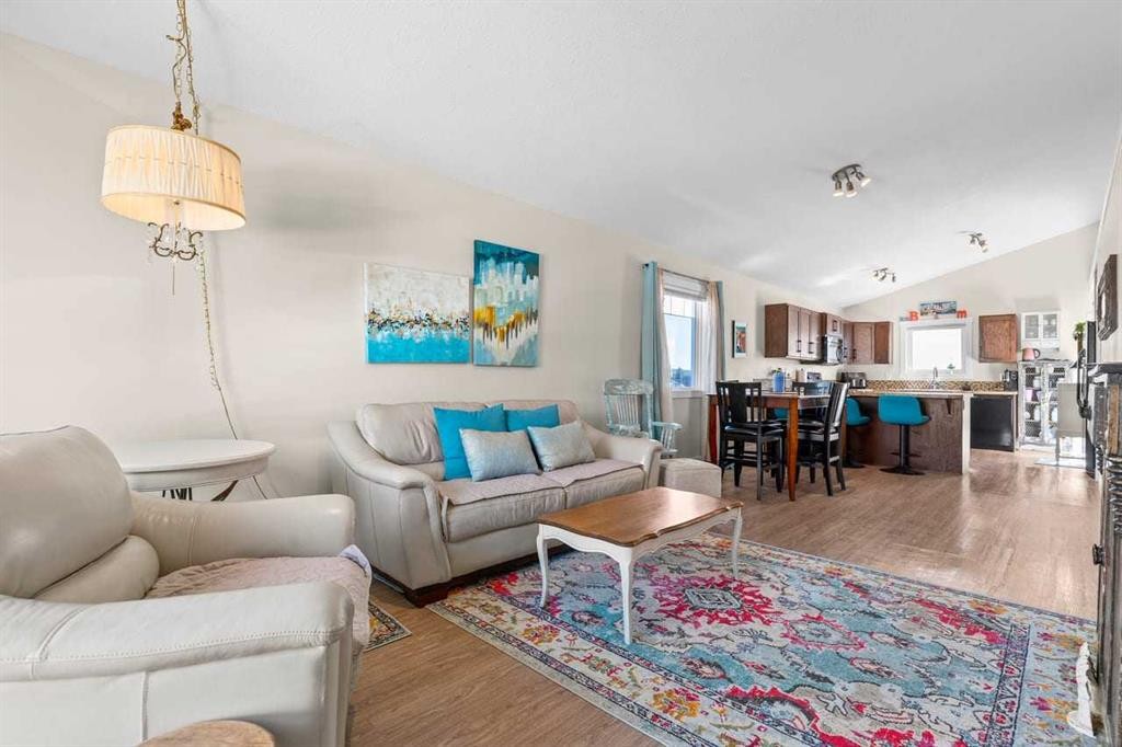317 Mcleod Crescent, Diamond Valley, AB - Indoor Photo Showing Living Room