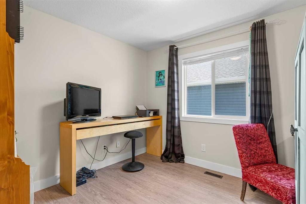 317 Mcleod Crescent, Diamond Valley, AB - Indoor Photo Showing Office