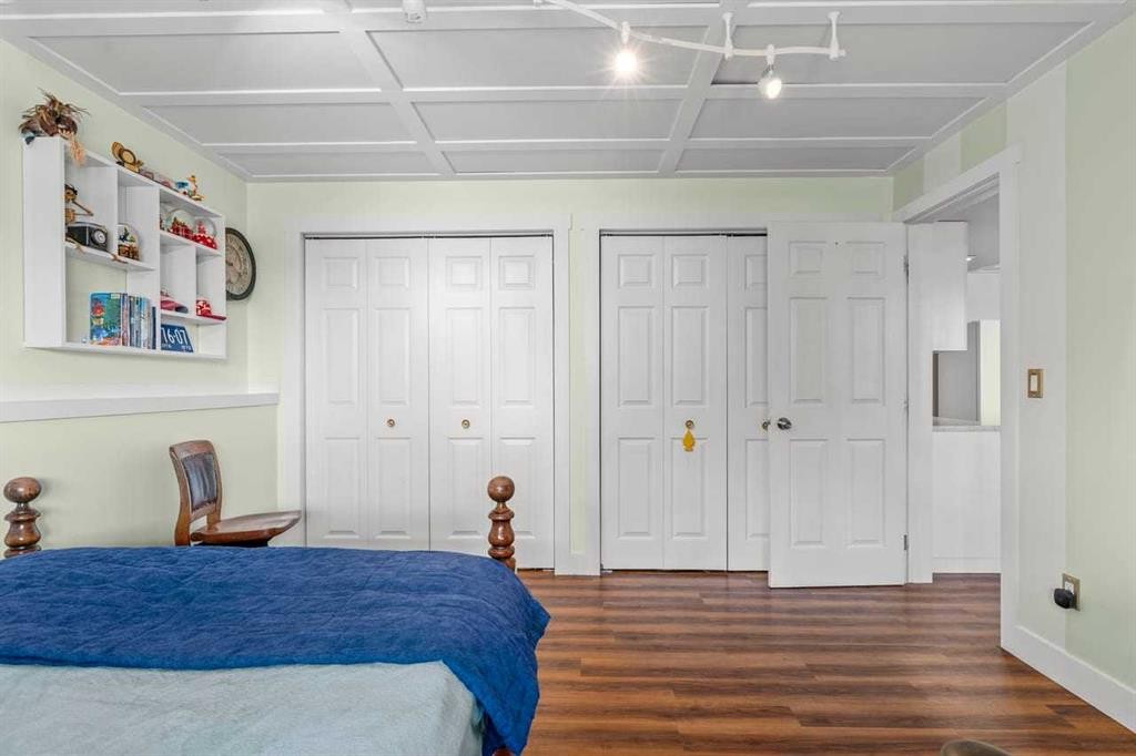 317 Mcleod Crescent, Diamond Valley, AB - Indoor Photo Showing Bedroom