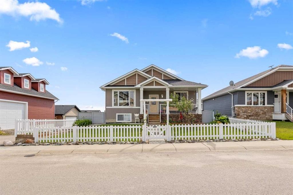 317 Mcleod Crescent, Diamond Valley, AB - Outdoor With Facade