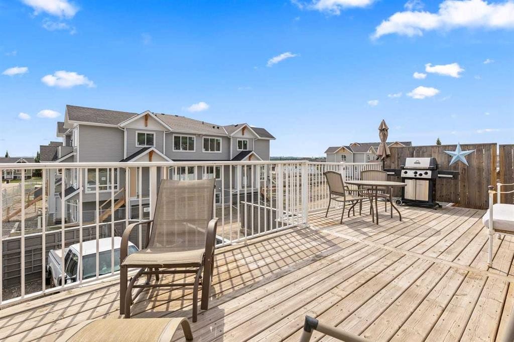 317 Mcleod Crescent, Diamond Valley, AB - Outdoor With Deck Patio Veranda