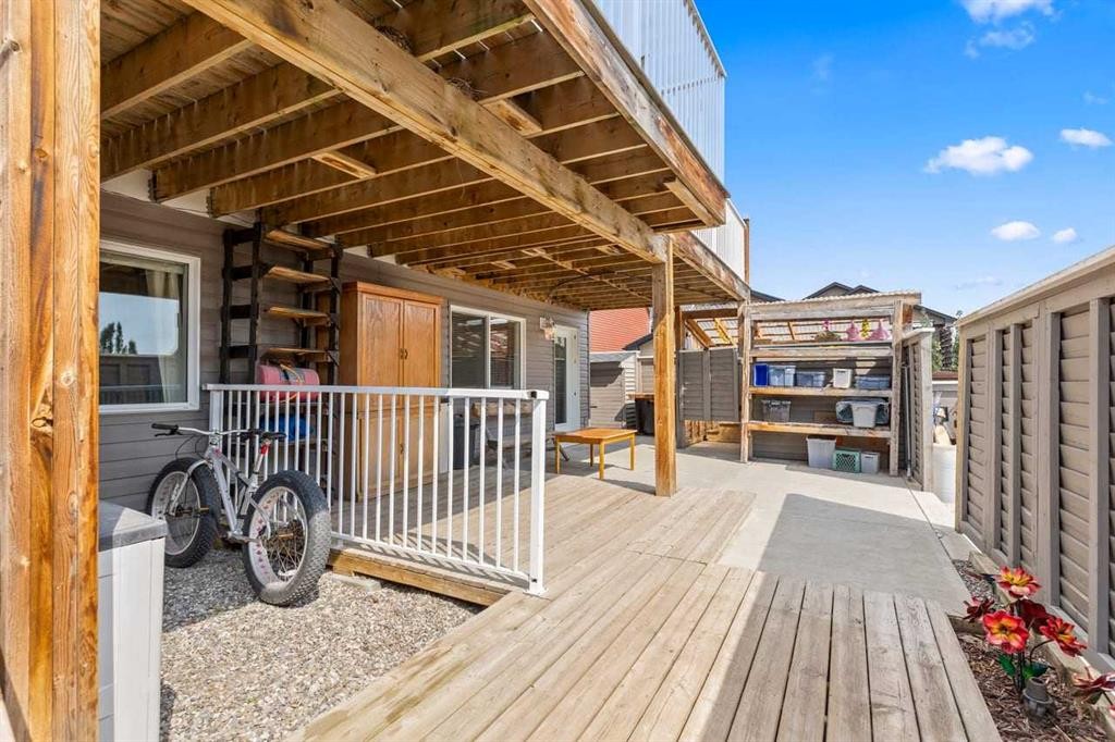 317 Mcleod Crescent, Diamond Valley, AB - Outdoor With Deck Patio Veranda