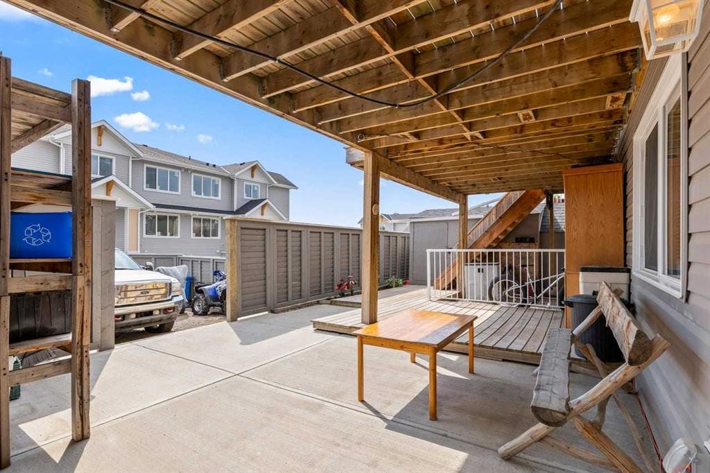317 Mcleod Crescent, Diamond Valley, AB - Outdoor With Deck Patio Veranda With Exterior