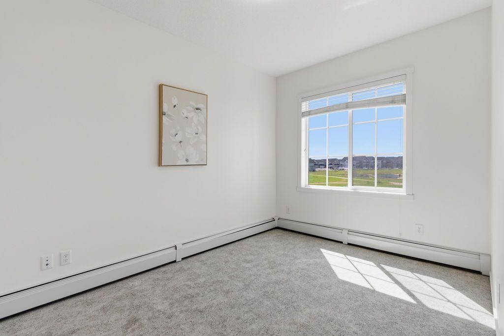 3209-99 Copperstone Park Se, Calgary, AB - Indoor Photo Showing Other Room