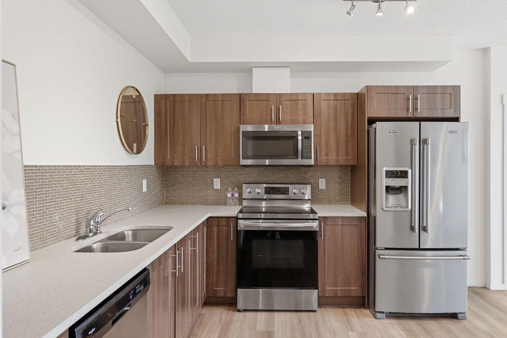 3209-99 Copperstone Park Se, Calgary, AB - Indoor Photo Showing Kitchen With Double Sink