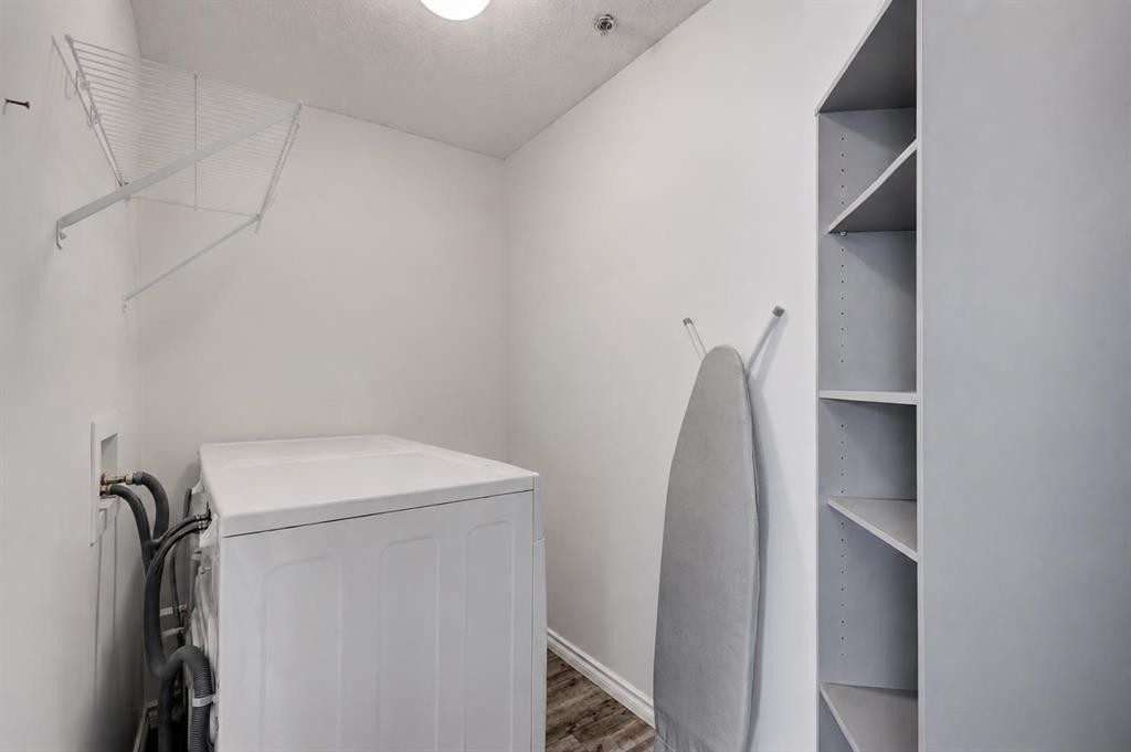 1114-1818 Simcoe Boulevard Sw, Calgary, AB - Indoor Photo Showing Laundry Room