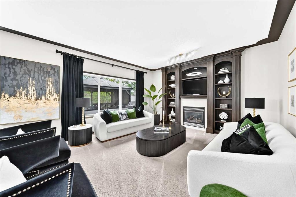 188 Hawkmere Way, Chestermere, AB - Indoor Photo Showing Living Room With Fireplace