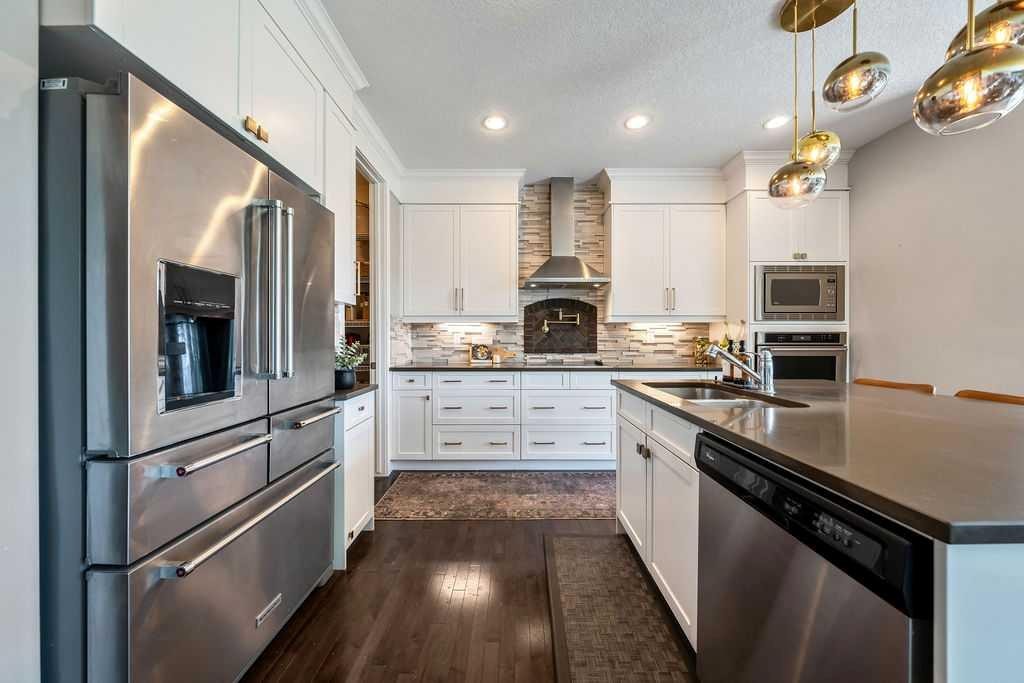 148 Rainbow Falls Glen, Chestermere, AB - Indoor Photo Showing Kitchen With Upgraded Kitchen