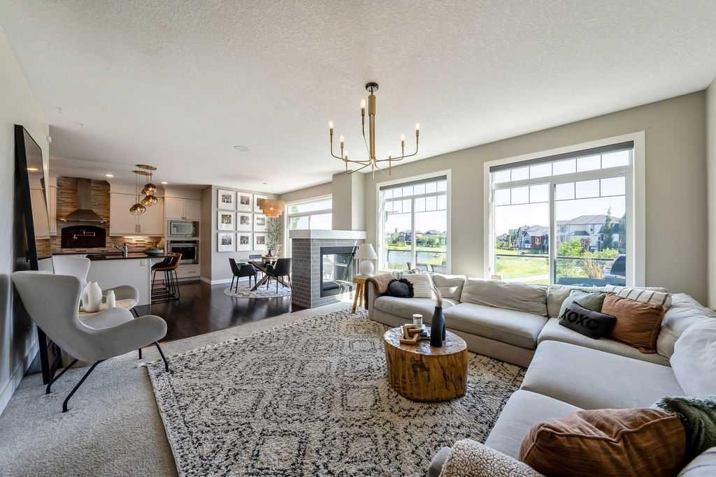 148 Rainbow Falls Glen, Chestermere, AB - Indoor Photo Showing Living Room With Fireplace