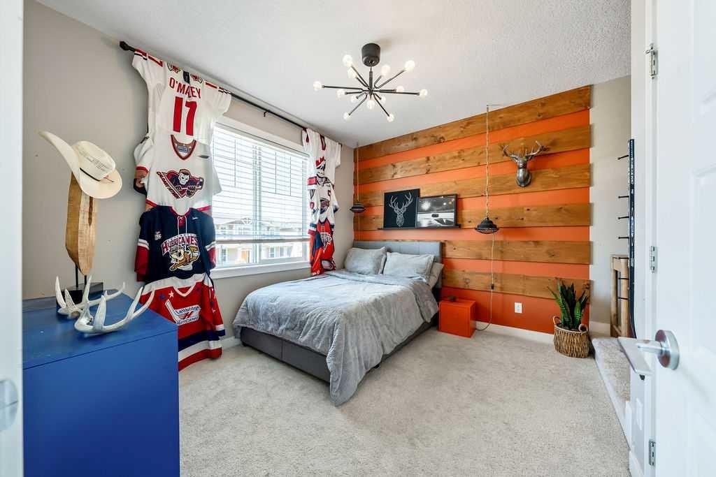 148 Rainbow Falls Glen, Chestermere, AB - Indoor Photo Showing Bedroom