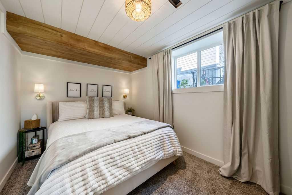148 Rainbow Falls Glen, Chestermere, AB - Indoor Photo Showing Bedroom