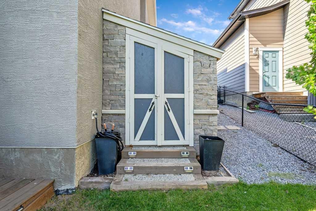 148 Rainbow Falls Glen, Chestermere, AB - Outdoor With Exterior