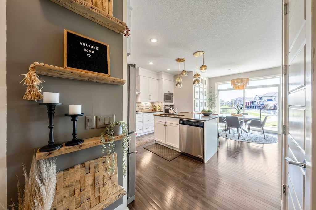 148 Rainbow Falls Glen, Chestermere, AB - Indoor Photo Showing Kitchen With Upgraded Kitchen