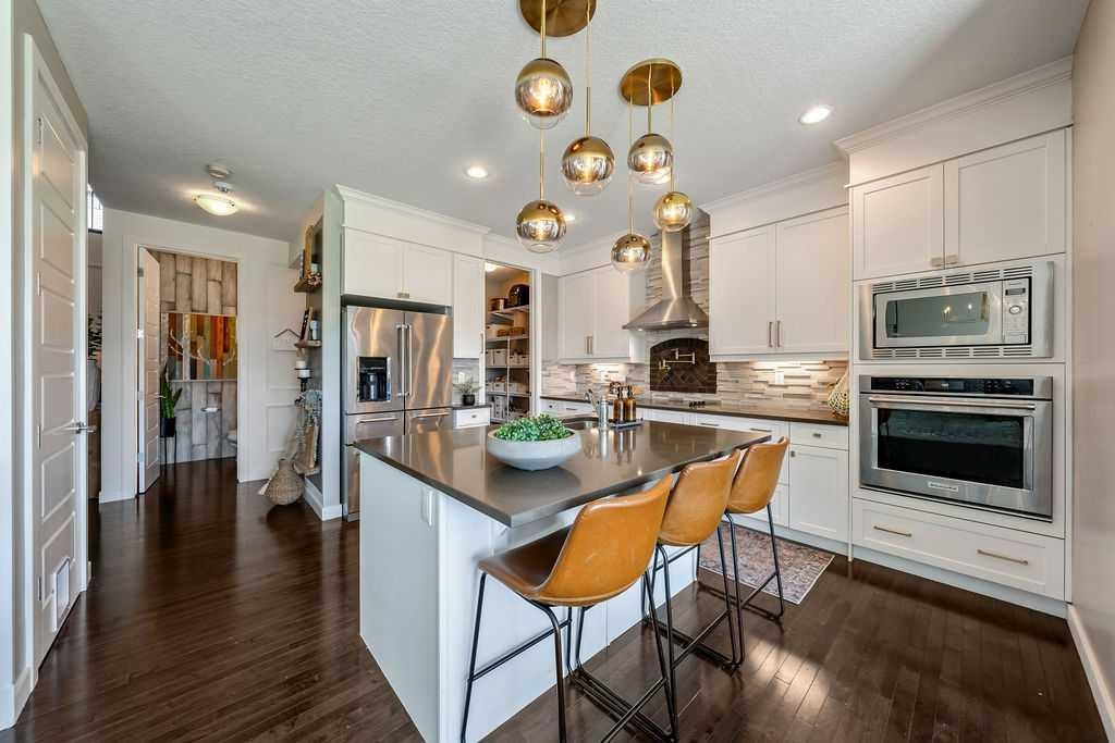 148 Rainbow Falls Glen, Chestermere, AB - Indoor Photo Showing Kitchen With Upgraded Kitchen