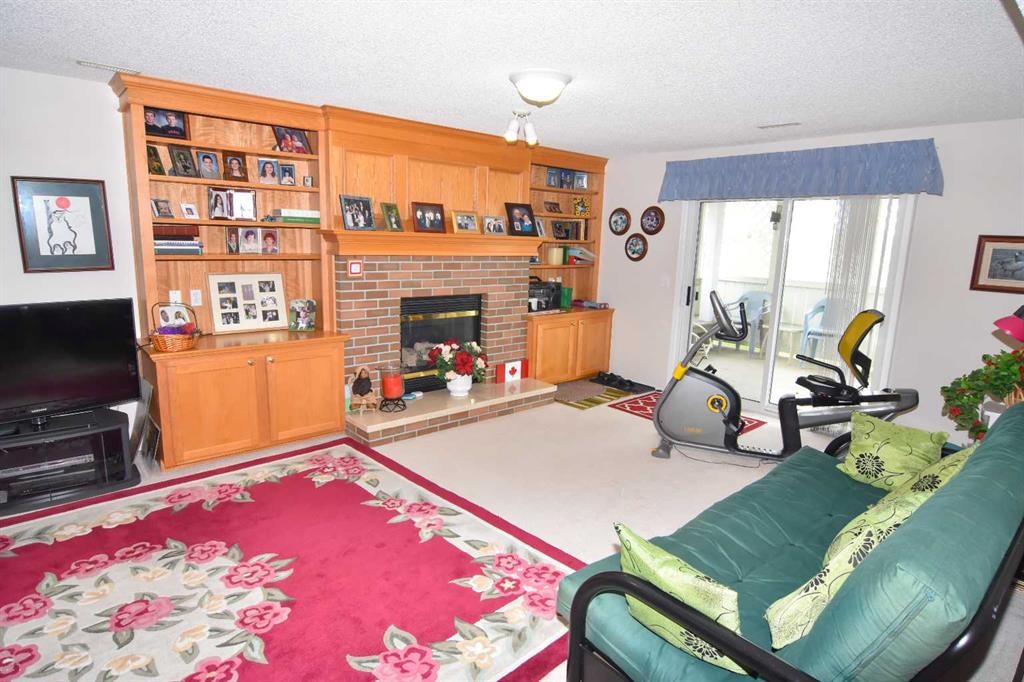33 Strathmore Lakes Bay, Strathmore, AB - Indoor With Fireplace