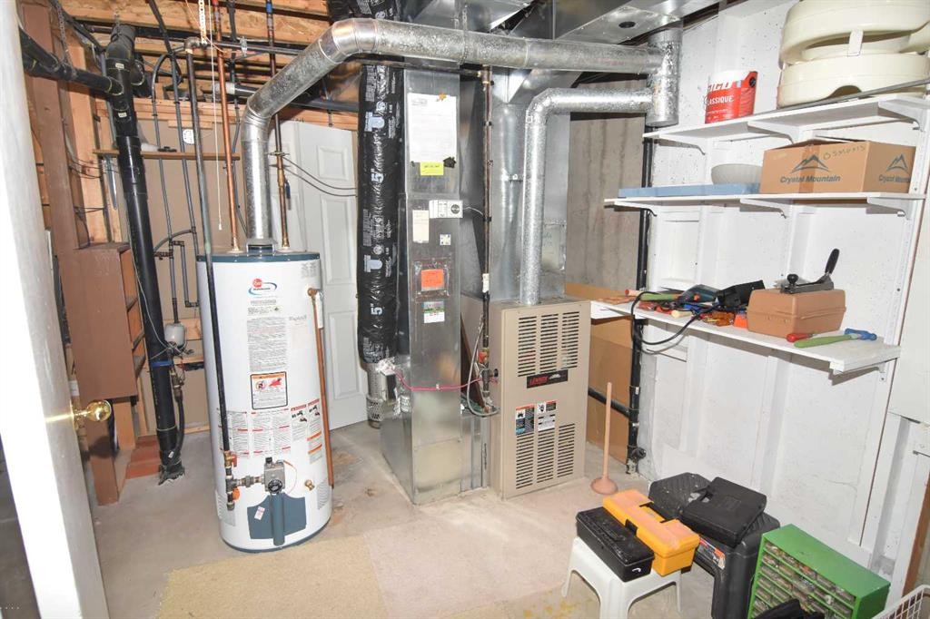 33 Strathmore Lakes Bay, Strathmore, AB - Indoor Photo Showing Basement