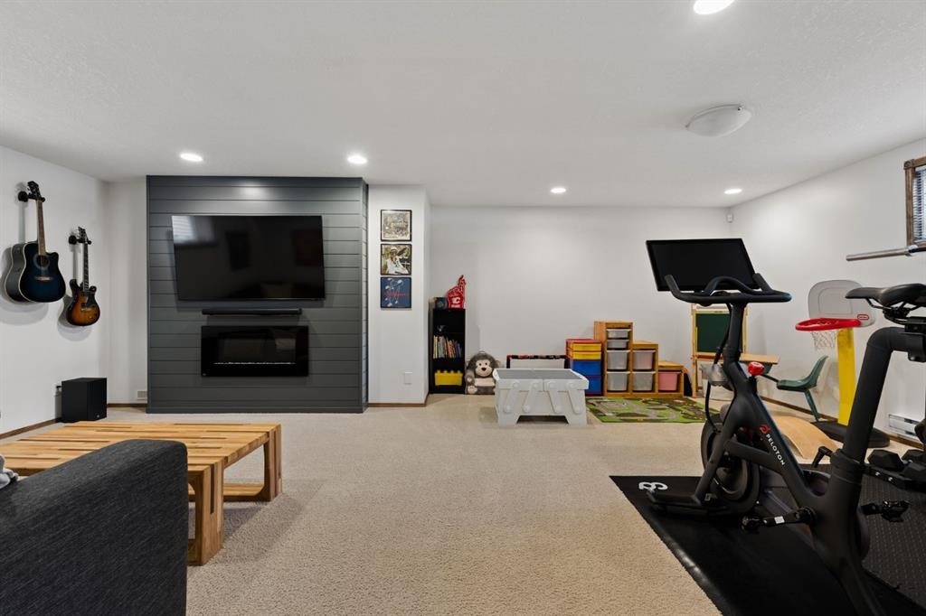 36 Cranfield Manor Se, Calgary, AB - Indoor Photo Showing Gym Room
