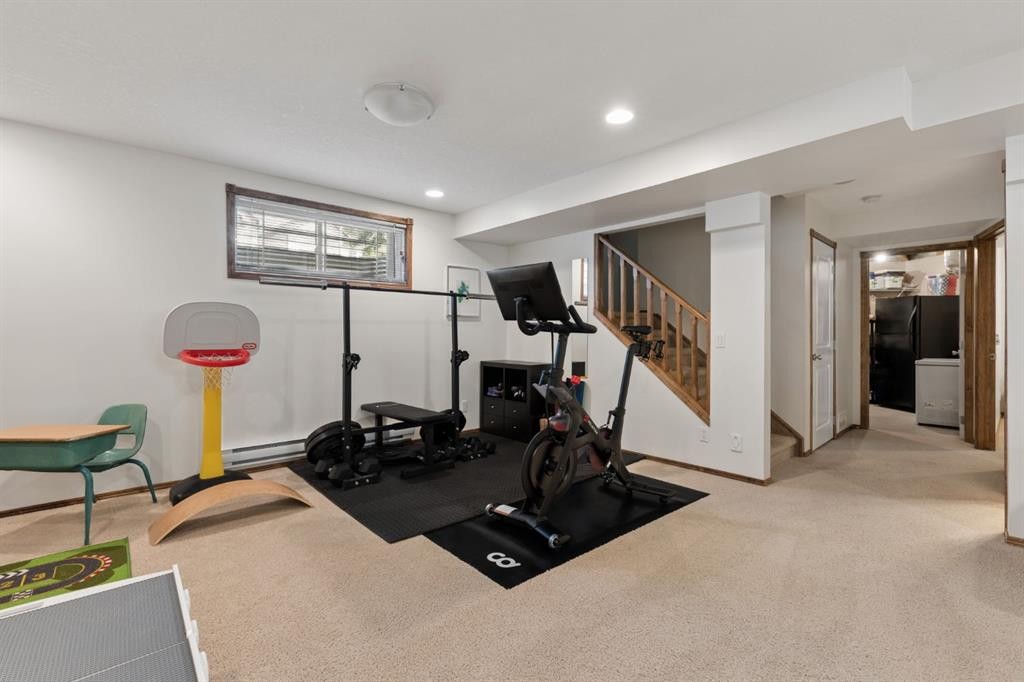 36 Cranfield Manor Se, Calgary, AB - Indoor Photo Showing Gym Room