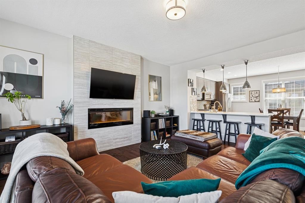 6 Quarry Lane Se, Calgary, AB - Indoor Photo Showing Living Room With Fireplace