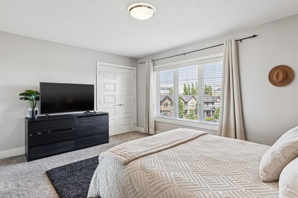 6 Quarry Lane Se, Calgary, AB - Indoor Photo Showing Bedroom