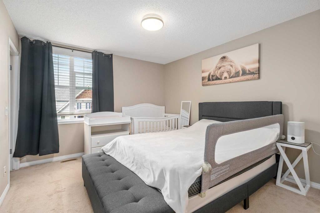 240 Elgin Meadows Gardens Se, Calgary, AB - Indoor Photo Showing Bedroom