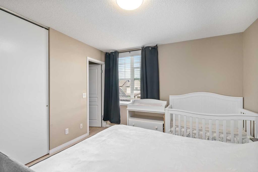 240 Elgin Meadows Gardens Se, Calgary, AB - Indoor Photo Showing Bedroom