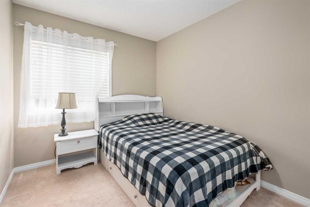 240 Elgin Meadows Gardens Se, Calgary, AB - Indoor Photo Showing Bedroom