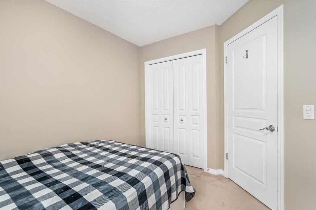 240 Elgin Meadows Gardens Se, Calgary, AB - Indoor Photo Showing Bedroom
