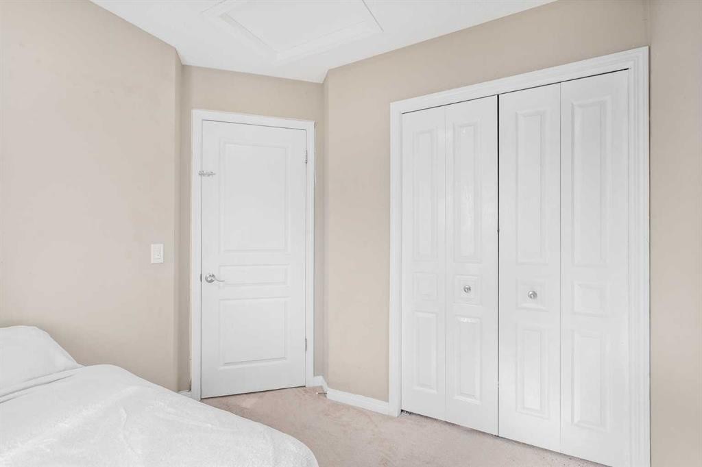 240 Elgin Meadows Gardens Se, Calgary, AB - Indoor Photo Showing Bedroom