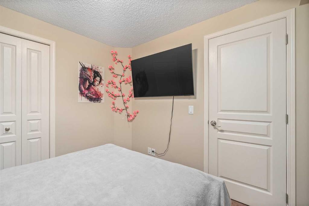 240 Elgin Meadows Gardens Se, Calgary, AB - Indoor Photo Showing Bedroom