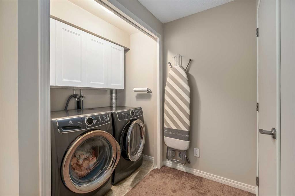 240 Elgin Meadows Gardens Se, Calgary, AB - Indoor Photo Showing Laundry Room