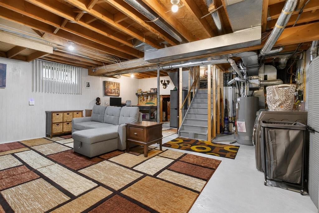 8 Erin Meadow Way Se, Calgary, AB - Indoor Photo Showing Basement