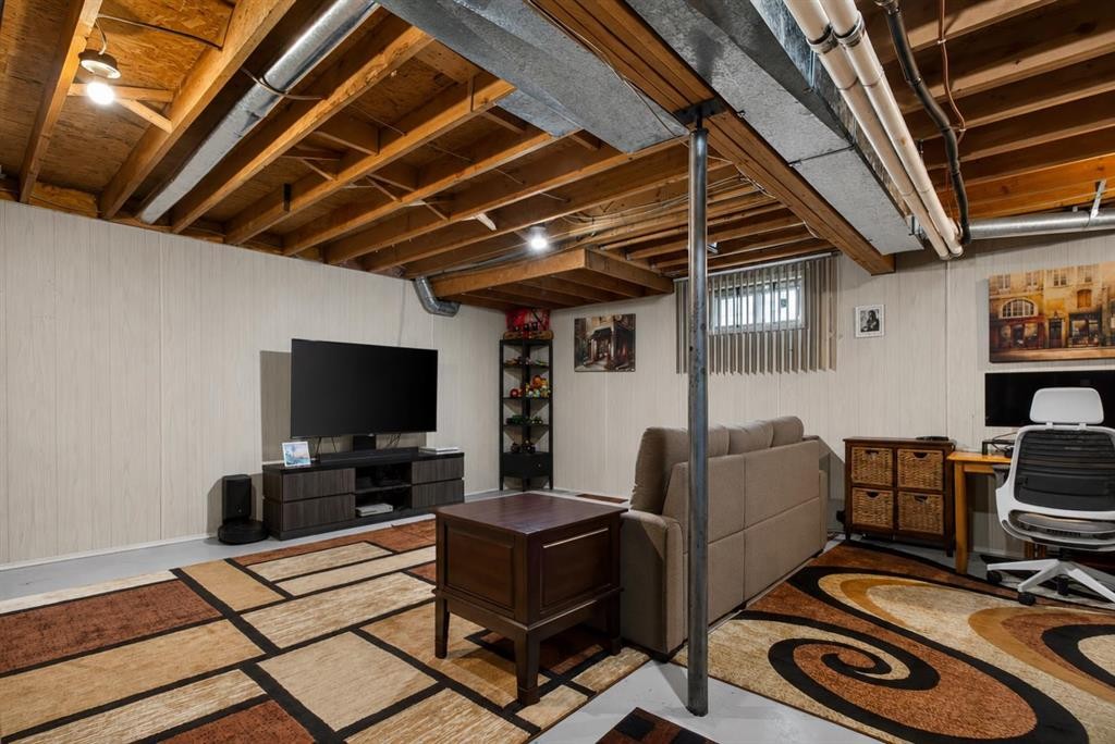 8 Erin Meadow Way Se, Calgary, AB - Indoor Photo Showing Basement