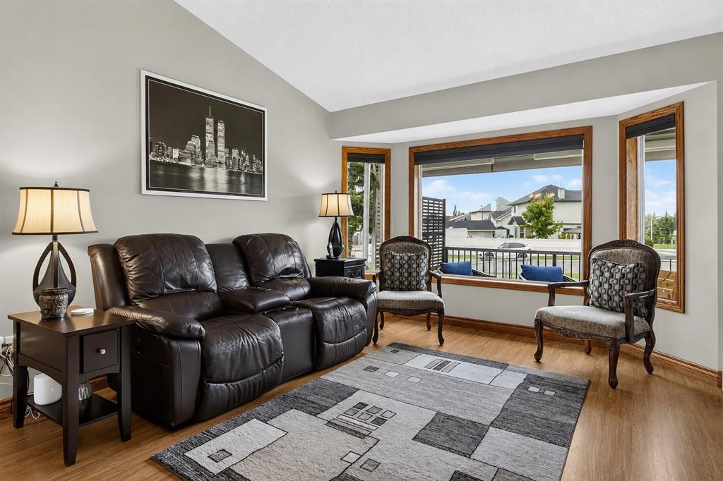 8 Erin Meadow Way Se, Calgary, AB - Indoor Photo Showing Living Room