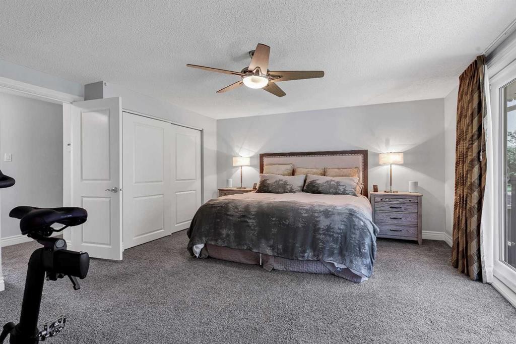 10907 Willowfern Drive Se, Calgary, AB - Indoor Photo Showing Bedroom
