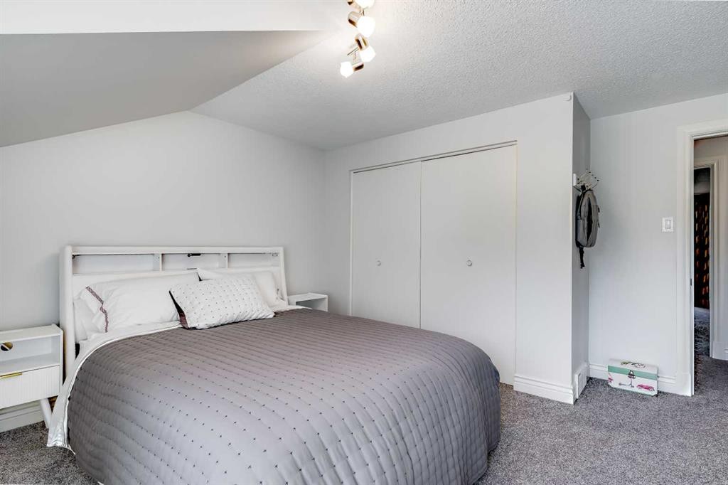 10907 Willowfern Drive Se, Calgary, AB - Indoor Photo Showing Bedroom