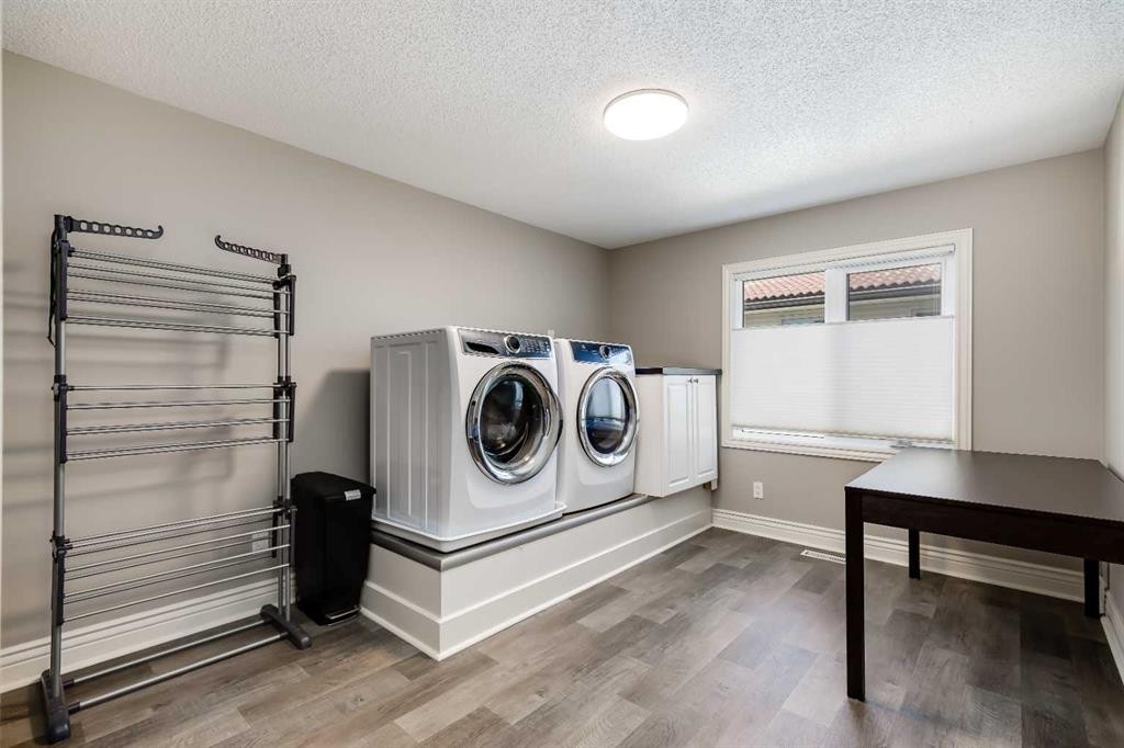 10907 Willowfern Drive Se, Calgary, AB - Indoor Photo Showing Laundry Room
