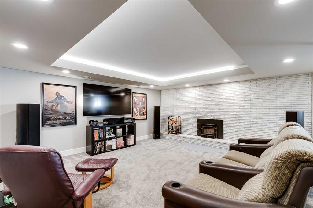 10907 Willowfern Drive Se, Calgary, AB - Indoor With Fireplace