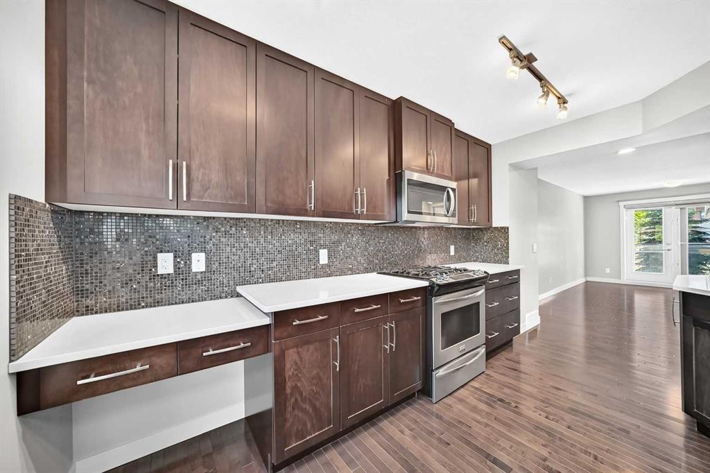 57 Aspen Hills Common Sw, Calgary, AB - Indoor Photo Showing Kitchen With Upgraded Kitchen