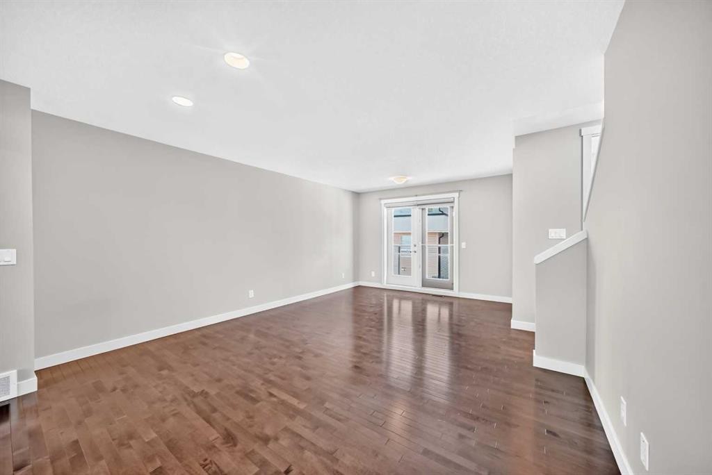 57 Aspen Hills Common Sw, Calgary, AB - Indoor Photo Showing Other Room