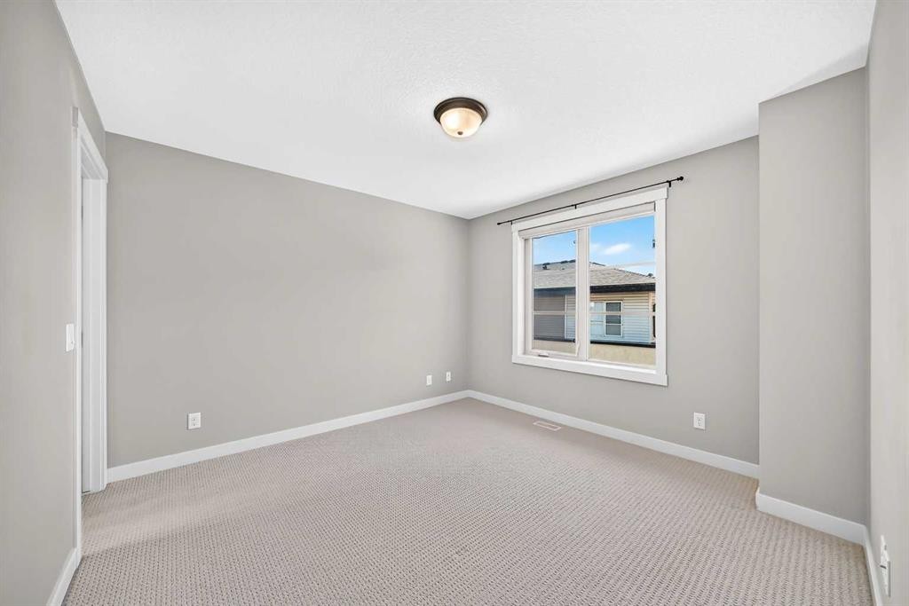 57 Aspen Hills Common Sw, Calgary, AB - Indoor Photo Showing Other Room