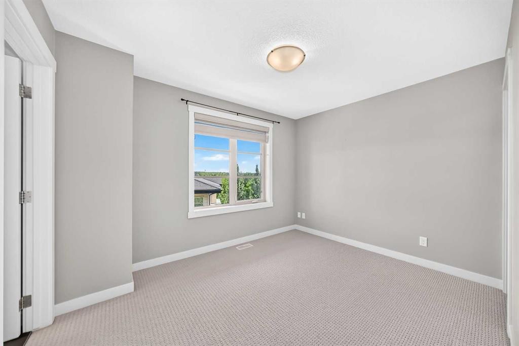 57 Aspen Hills Common Sw, Calgary, AB - Indoor Photo Showing Other Room