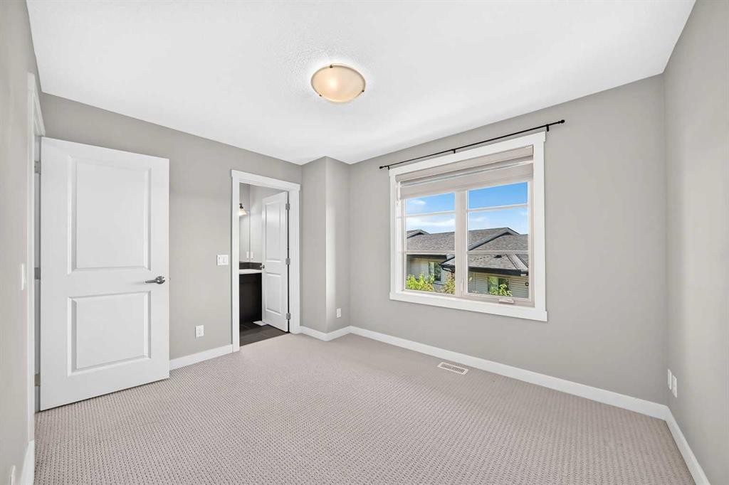 57 Aspen Hills Common Sw, Calgary, AB - Indoor Photo Showing Other Room