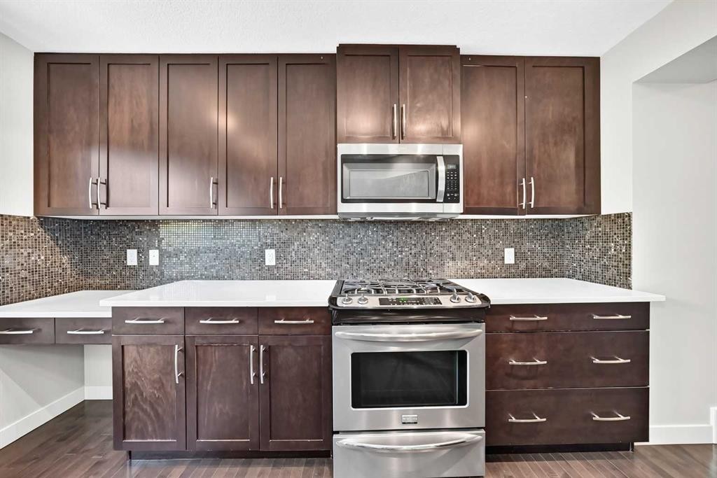 57 Aspen Hills Common Sw, Calgary, AB - Indoor Photo Showing Kitchen With Upgraded Kitchen