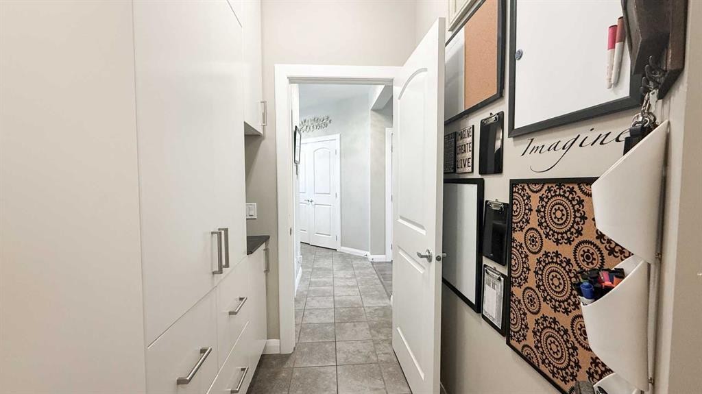31 Ravenslea Crescent Se, Airdrie, AB - Indoor Photo Showing Other Room