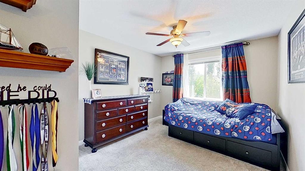31 Ravenslea Crescent Se, Airdrie, AB - Indoor Photo Showing Bedroom