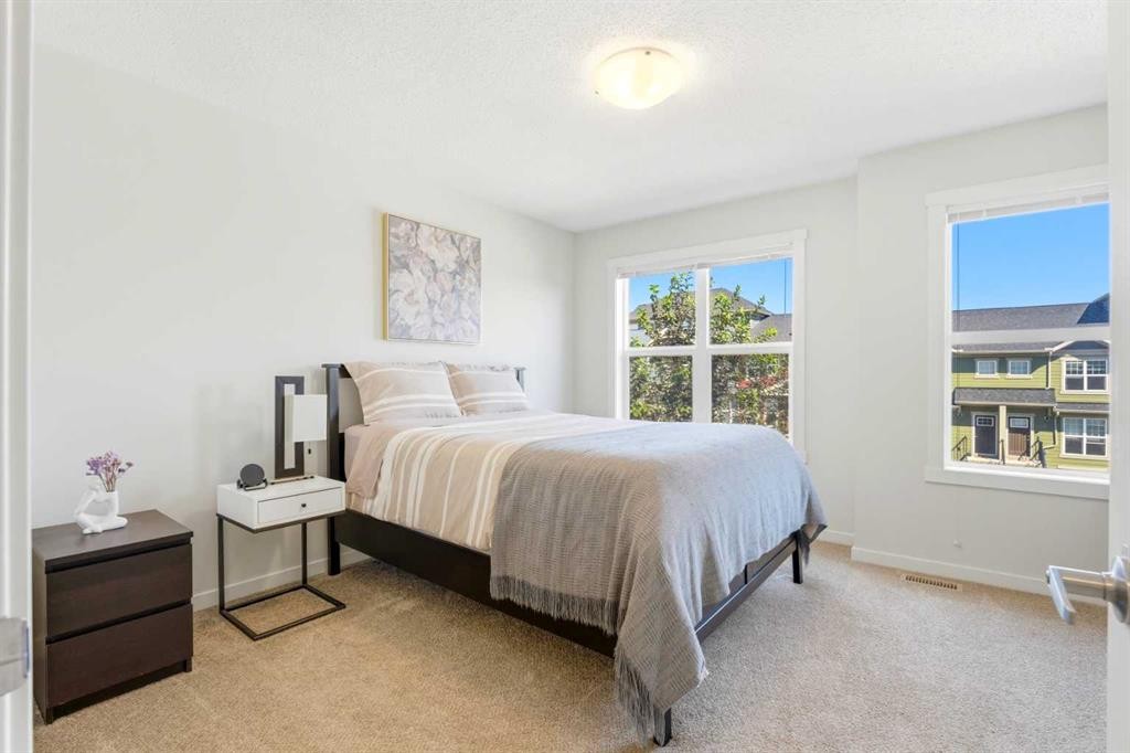 412 Cranbrook Square Se, Calgary, AB - Indoor Photo Showing Bedroom