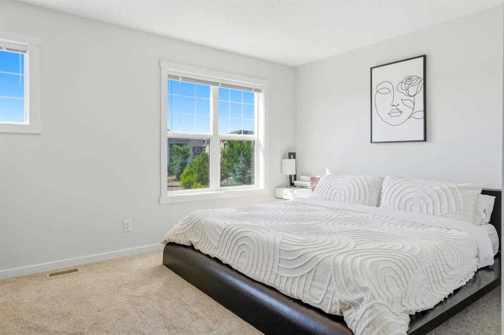 412 Cranbrook Square Se, Calgary, AB - Indoor Photo Showing Bedroom