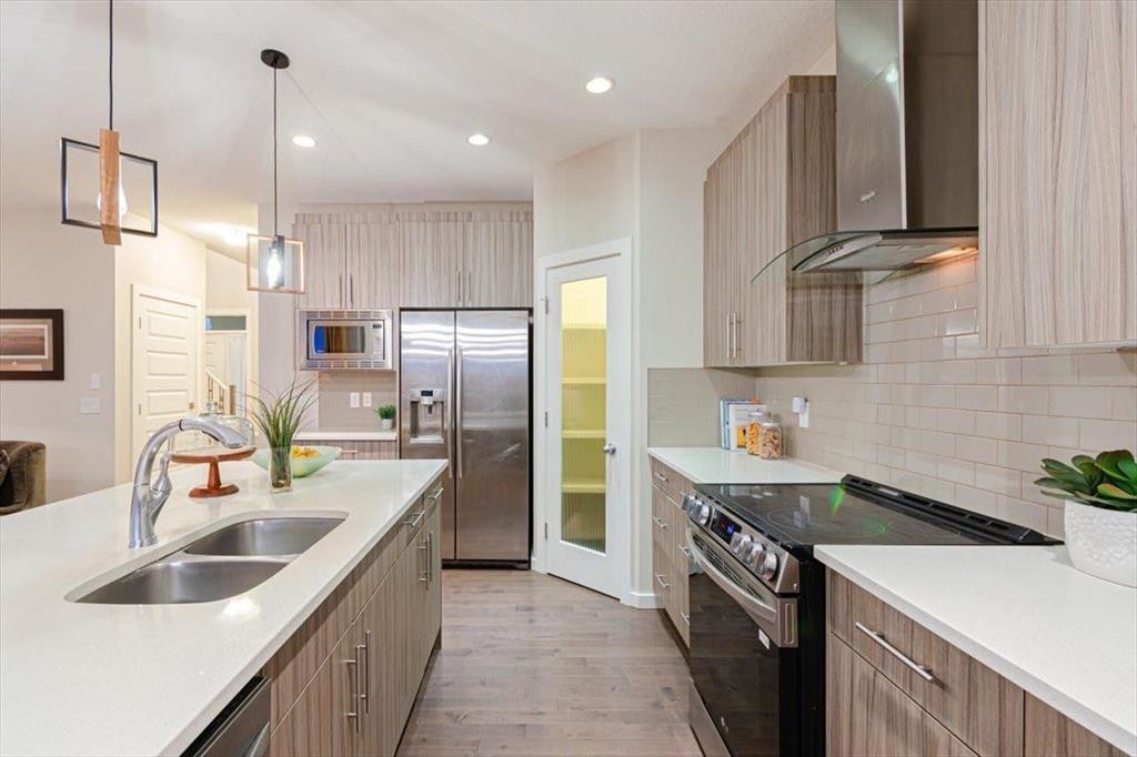 138 Copperpond Street Se, Calgary, AB - Indoor Photo Showing Kitchen With Double Sink With Upgraded Kitchen